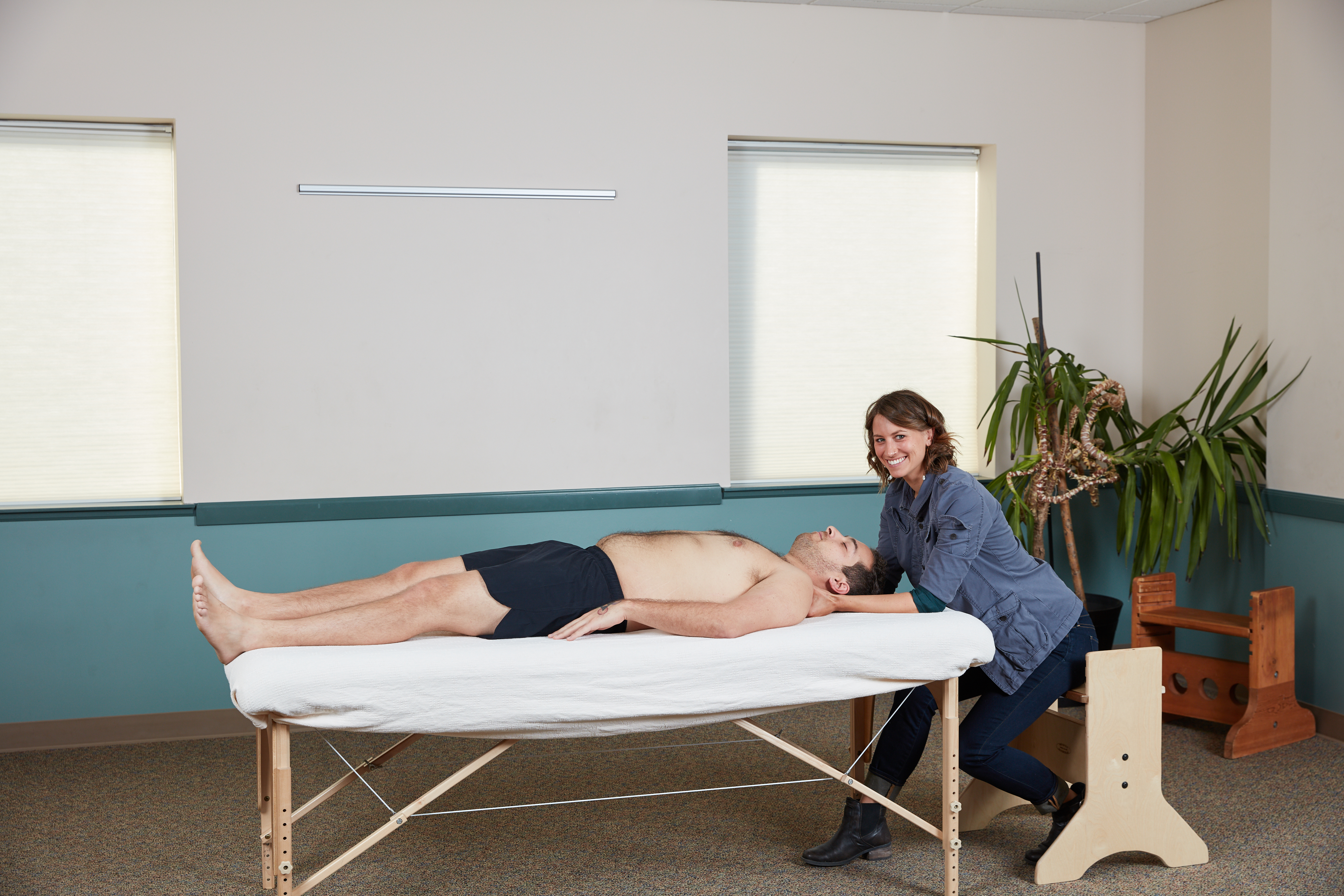 man getting rolfing treatment
